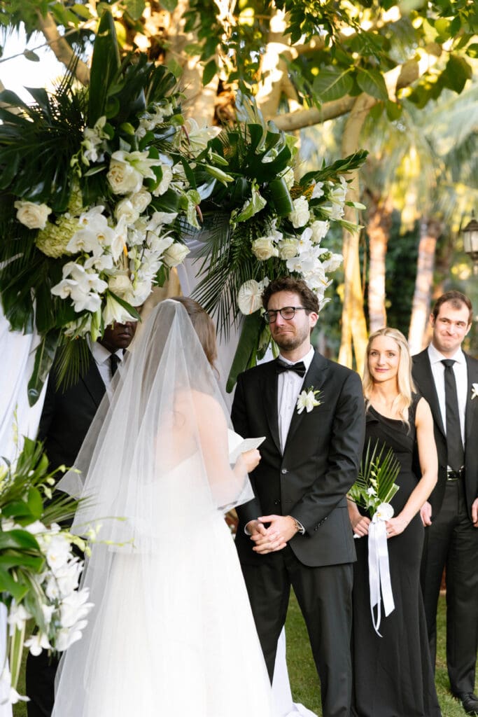 Intimate private residence wedding ceremony in Naples Florida with tropical florals