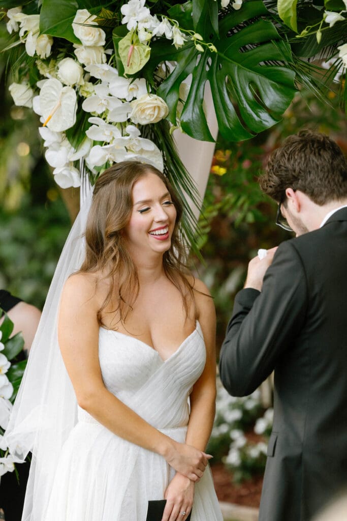 Outdoor tropical wedding ceremony at private residence in Naples Florida
