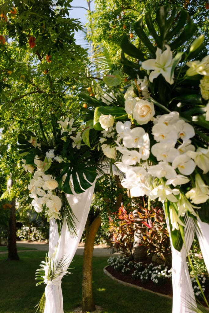 Tropical wedding details with colorful florals at Naples Florida private residence wedding