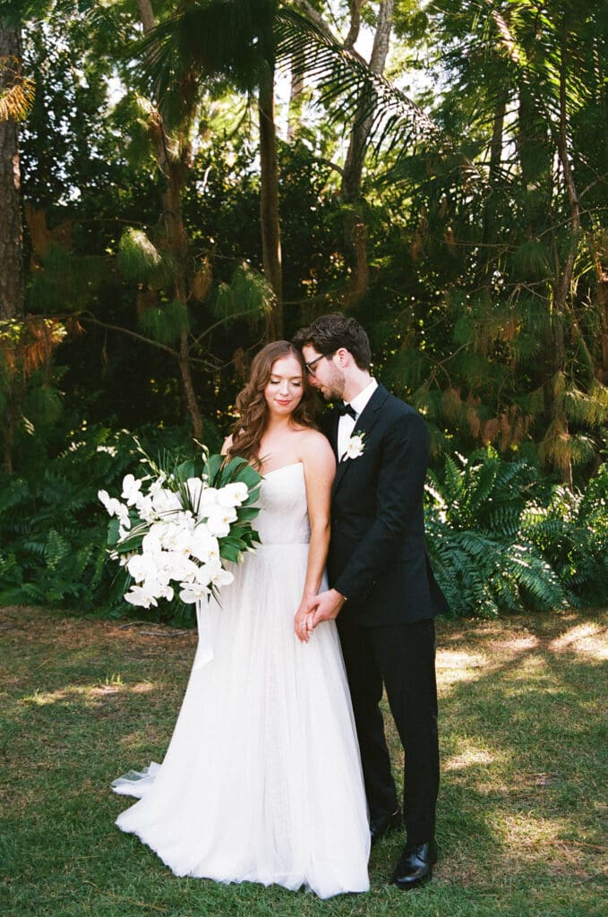 Colorful tropical wedding portraits in Naples Florida captured by Naples wedding photographer