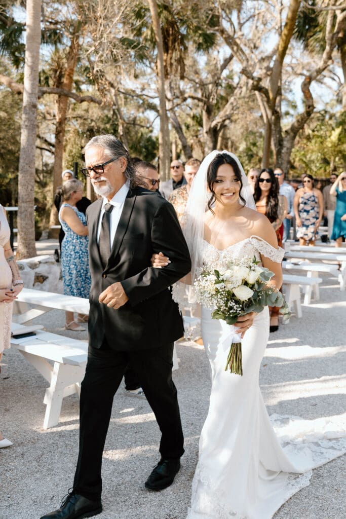 Autumn and Ryan exchanging vows at their private residence wedding in Venice Florida