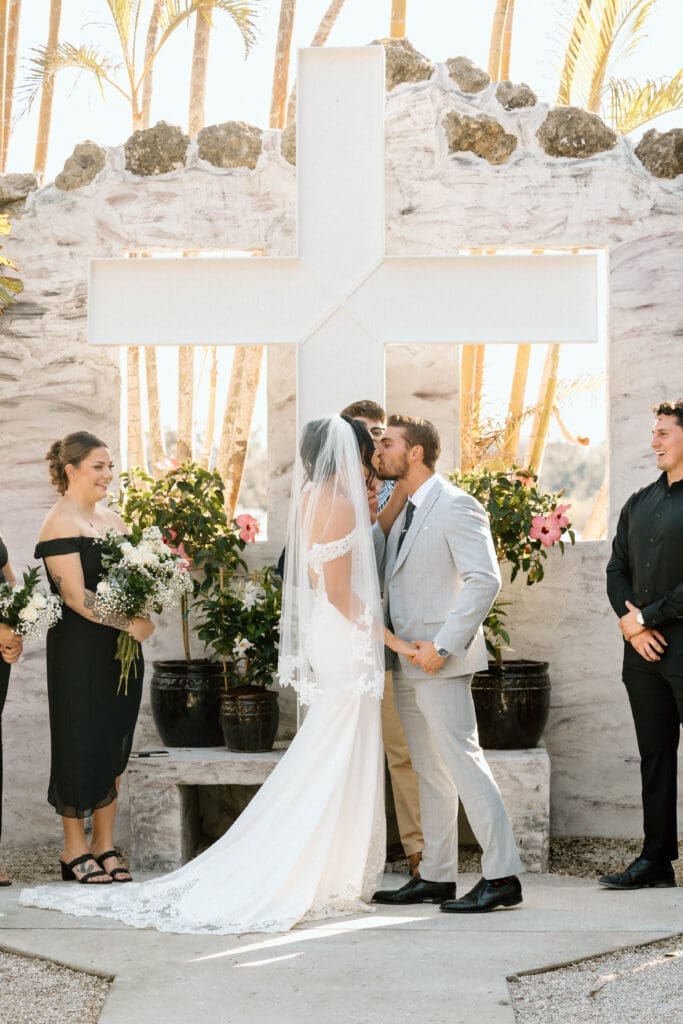 Wedding ceremony at private residence in Venice Florida photographed by Sarasota wedding photographer