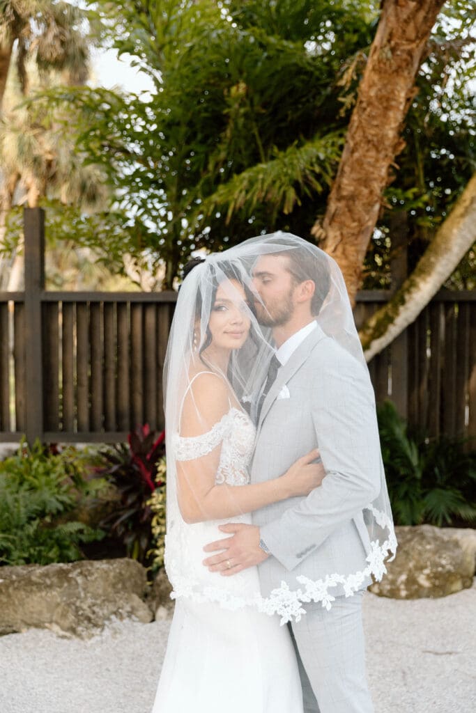 Romantic bride and groom portraits at Venice Florida backyard wedding near Sarasota